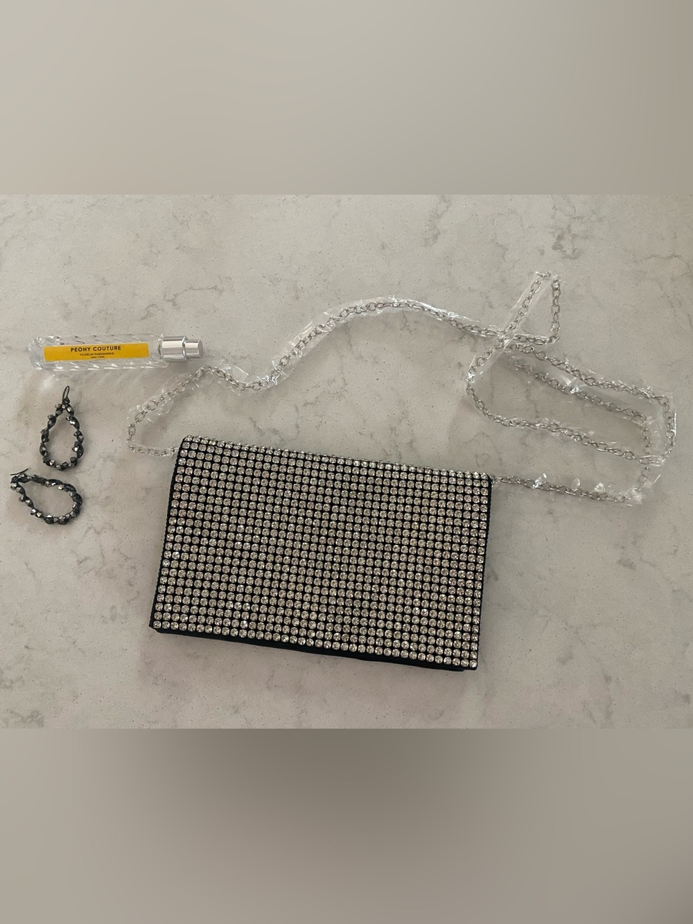 Amber Sceats The Stella Crystal-Embellished Black Clutch Bag with Silver Chain